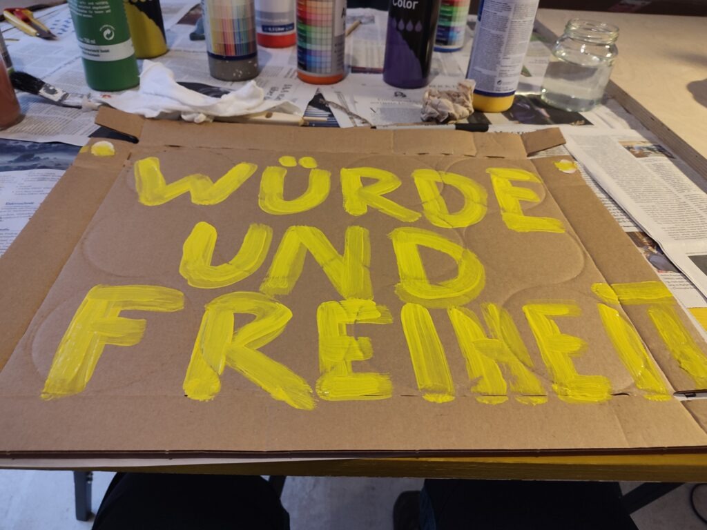 Plakat: Würde und Freiheit!